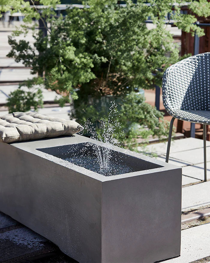 Concrete bench with a build in fountain