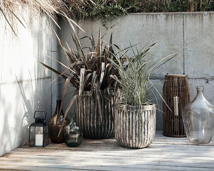 Outdoor decoration with planters, vases and lanterns